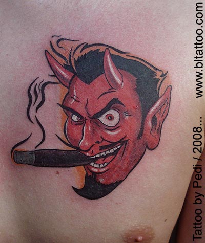 Devil tattoo design in hand.