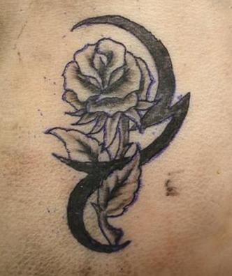 Here is the tattoo: Not sure if you can see, but the bottom half is a bit 